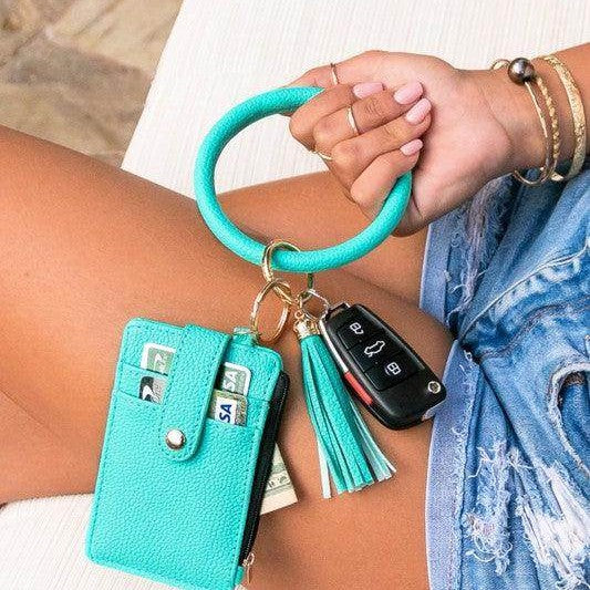 Aili's Corner ID holder keychain bracelet in turquoise with keys and card holder attached