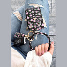 Floral Aili's Corner ID holder keychain bracelet with attached key fob and stylish design