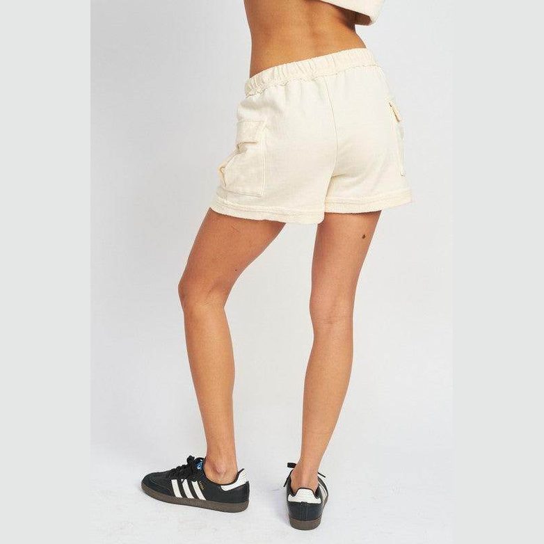 Ivory cargo shorts for women with a comfortable elastic waistband and side pockets