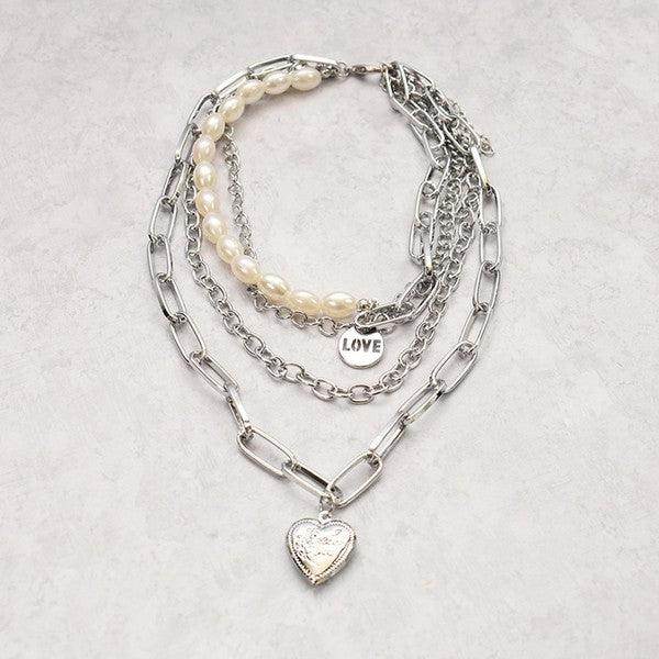 ClaudiaG Collection jester necklace for women featuring layered silver chains and pearl accents
