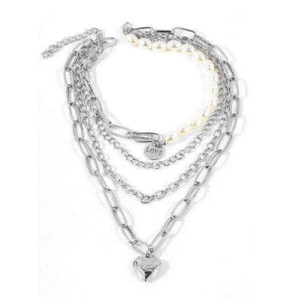 ClaudiaG Collection jester necklace for women featuring multiple silver chains and a heart pendant