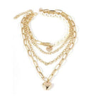 Elegant ClaudiaG jester necklace for women featuring layered gold chains and a heart charm