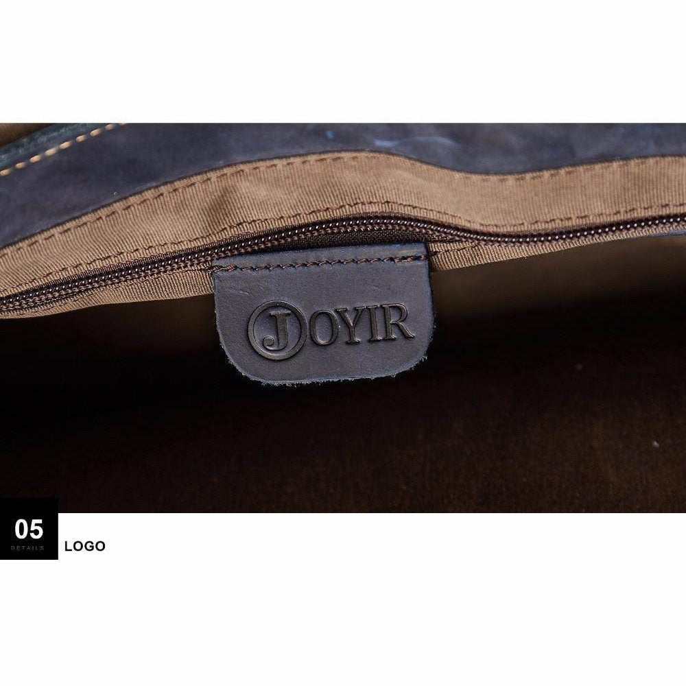 Close-up of the interior zipper of a vintage leather mens briefcase by VacationGrabs