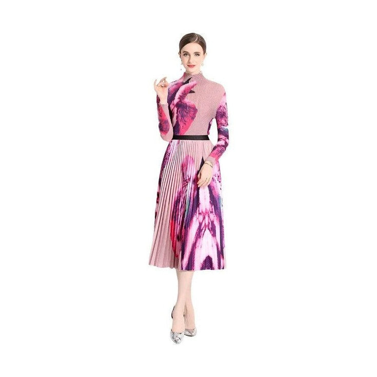By Claude knee-length dress for travel with a vibrant floral pattern and pleated style