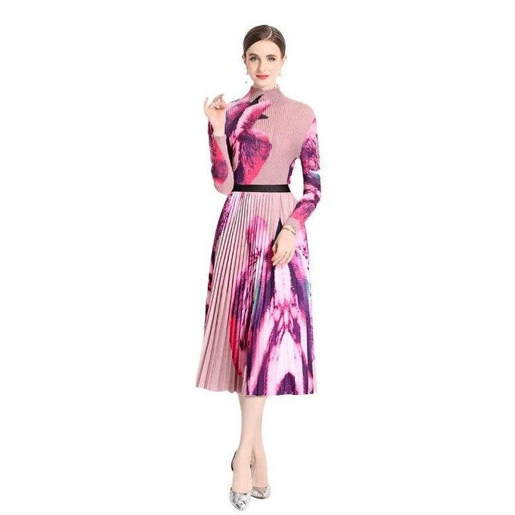 By Claude knee-length dress for travel with a vibrant floral pattern and pleated style