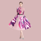 By Claude stylish knee-length dress for travel with colorful pleated design and long sleeves
