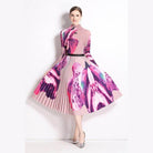 By Claude knee-length dress for travel with vibrant floral prints and pleated design