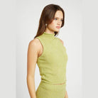 Emory Park knit sleeveless blouse in light green with a high neckline, perfect for spring styling