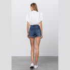 Back view of Insane Gene women's lace lining denim shorts with a frayed hem and casual fit
