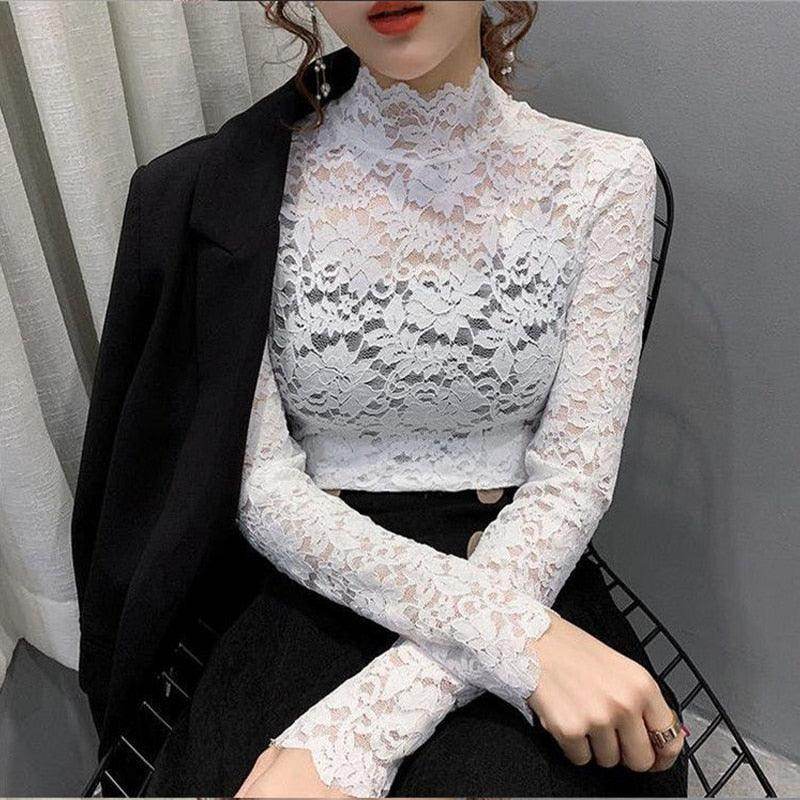 Elegant white lace top for women with long sleeves and a high neck, perfect for stylish occasions