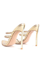 Gold strappy stiletto heeled sandals with thin high heels and elegant design by Rag Company