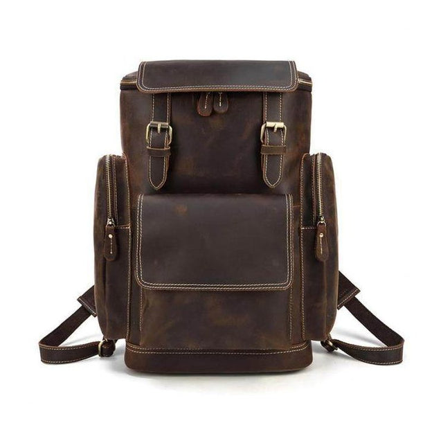 Large leather backpack for travel with multiple compartments and adjustable straps