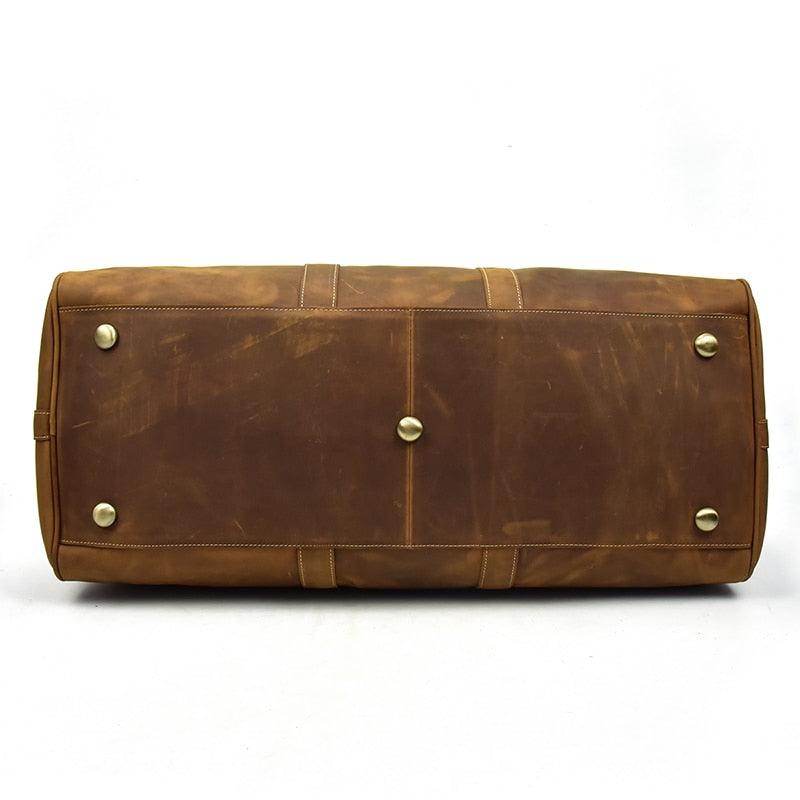 Large leather weekend bag from VacationGrabs with durable stitching and brass feet for stability