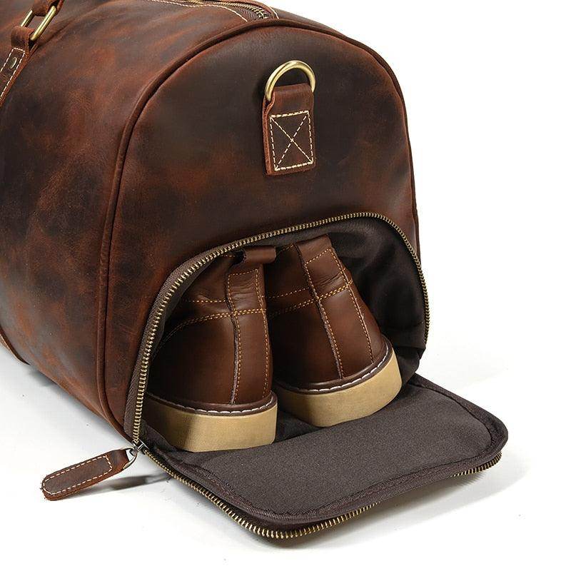 Large leather weekend bag with shoe compartment and stylish design for quick travel trips