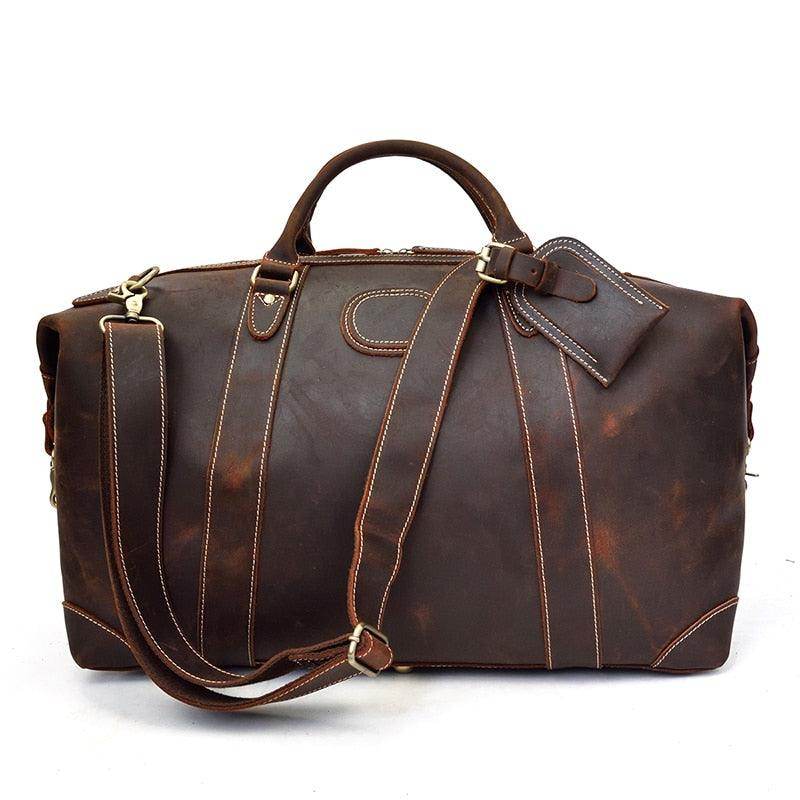 Large leather weekend bag by VacationGrabs in rich brown with sturdy handles and adjustable strap