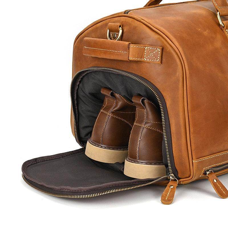 Large leather weekend bag with a spacious interior and separate shoe compartment for easy travel