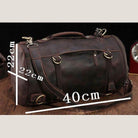 Large travel bag for men in brown leather with sturdy handles and adjustable shoulder strap for travel convenience