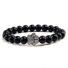 Lava stone pet bracelet for men featuring a silver paw print charm on a stylish beaded design