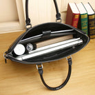 Interior view of a leather laptop briefcase men with organized compartments for laptops and accessories
