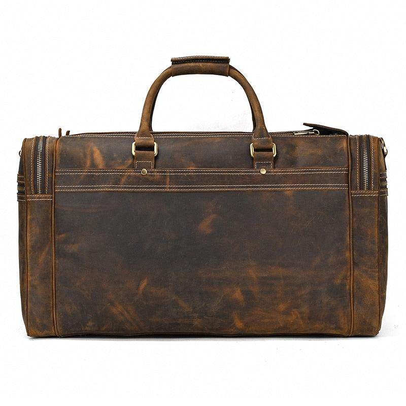 Brown leather luggage tote bag with durable handles and multiple pockets for organized travel