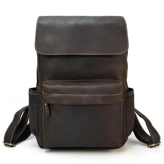 VacationGrabs leather travel backpack in dark brown with multiple pockets and adjustable straps