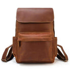 Brown leather travel backpack with multiple pockets and adjustable straps for stylish outings