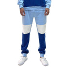 Light blue mens sweatpants with contrasting panels, perfect for casual or athletic wear
