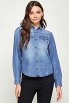 Blue Age lightweight denim shirt for travel with long sleeves and button-down front on a woman
