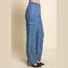 VacationGrabs women's lightweight travel pants with pockets in blue featuring cargo side pockets and elastic waistband