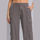 Women's lightweight travel pants with pockets in gray from VacationGrabs featuring cargo pockets and elastic waistband