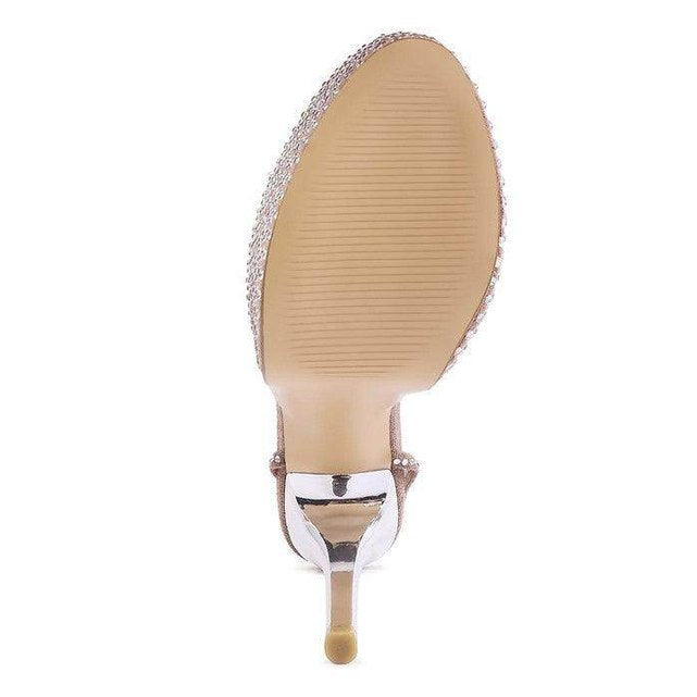 Bottom view of Rag Company elegant evening shoes featuring a sleek design and sparkling embellishments