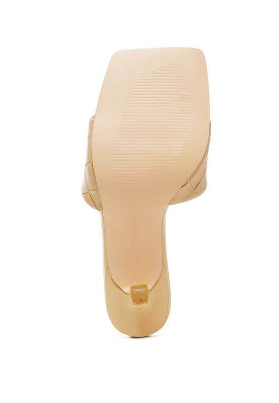 Stylish woven sandals by Rag Company featuring a sleek heel and high-quality material for elegance