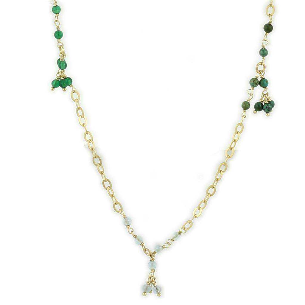 Long matte gold necklace for travel featuring green gemstone accents and elegant chain design