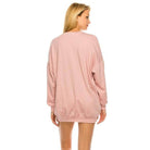 Back view of pink Women's Dress from Andante USA, featuring the love out loud dress design for a stylish look.