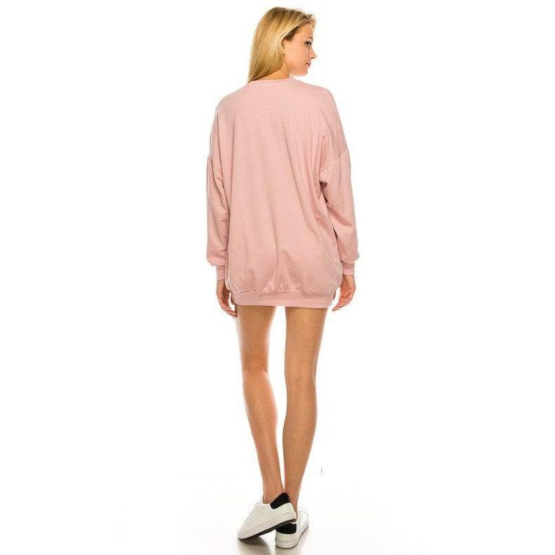Back view of the Andante USA Love Out Loud Dress in soft pink with relaxed fit and long sleeves