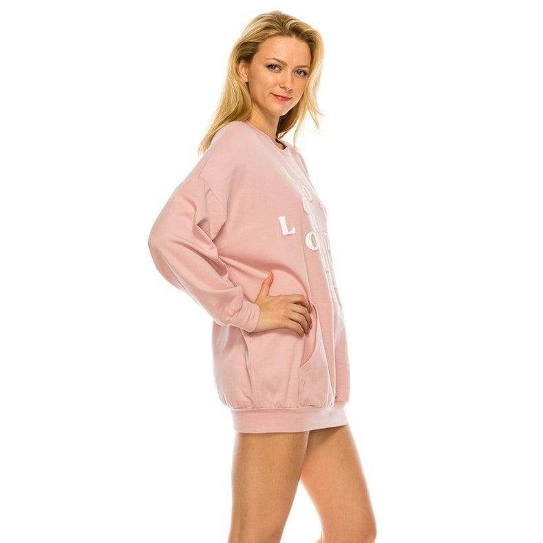 Pink sweatshirt dress with 'Love' graphic by Andante USA, perfect for casual outings