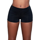 BE WICKED seamless butt enhancer shorts in black mid rise smooth fabric front view on model