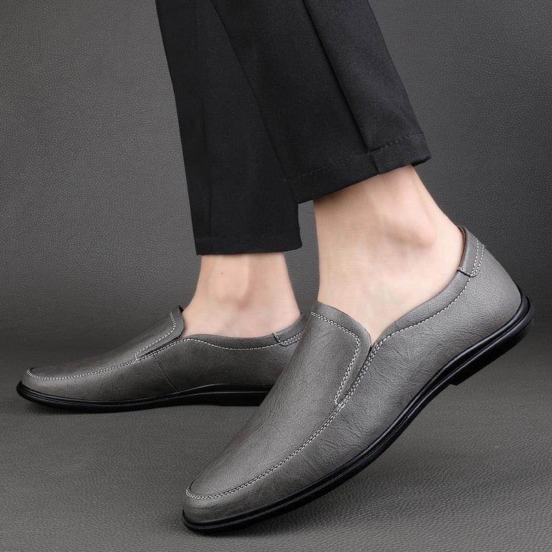 Stylish luxury Italian loafers in grey, perfect for both casual and formal occasions