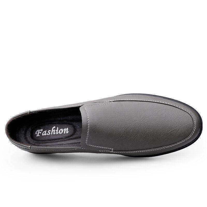 Gray luxury Italian loafers for men with a stylish slip-on design and comfortable insole