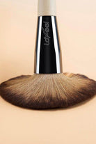 Sifides makeup brush set travel case featuring a large, soft brush with a sleek handle for easy application