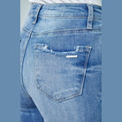 Insane Gene women's trendy skinny jeans for travel featuring distressed back pocket detail in light blue wash