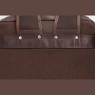 Mens leather backpack with breathable mesh panel and sturdy handle for comfortable carrying