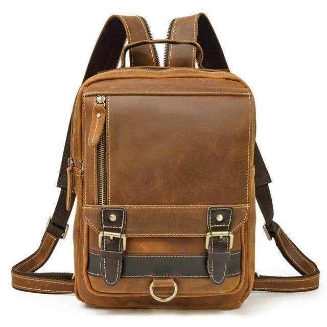 Mens leather travel bag in brown with multiple pockets and adjustable straps for convenient travel