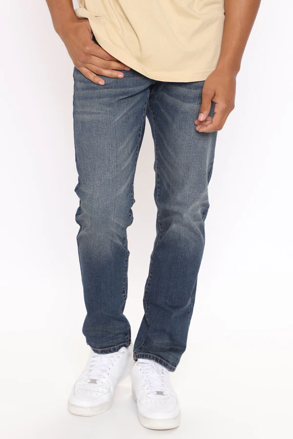 VacationGrabs mens slim fit jeans vintage blue worn with white sneakers and beige shirt