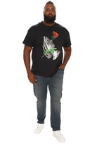 VacationGrabs mens slim fit jeans vintage blue worn by man paired with graphic black t-shirt and white sneakers