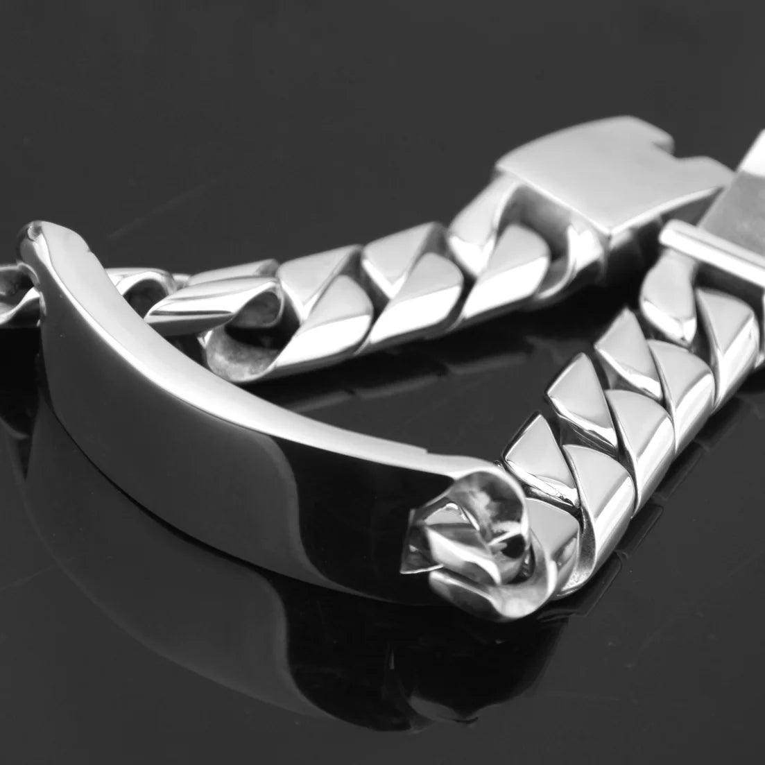 Close-up of VacationGrabs men's stainless steel ID bracelet with a sleek design and sturdy clasp