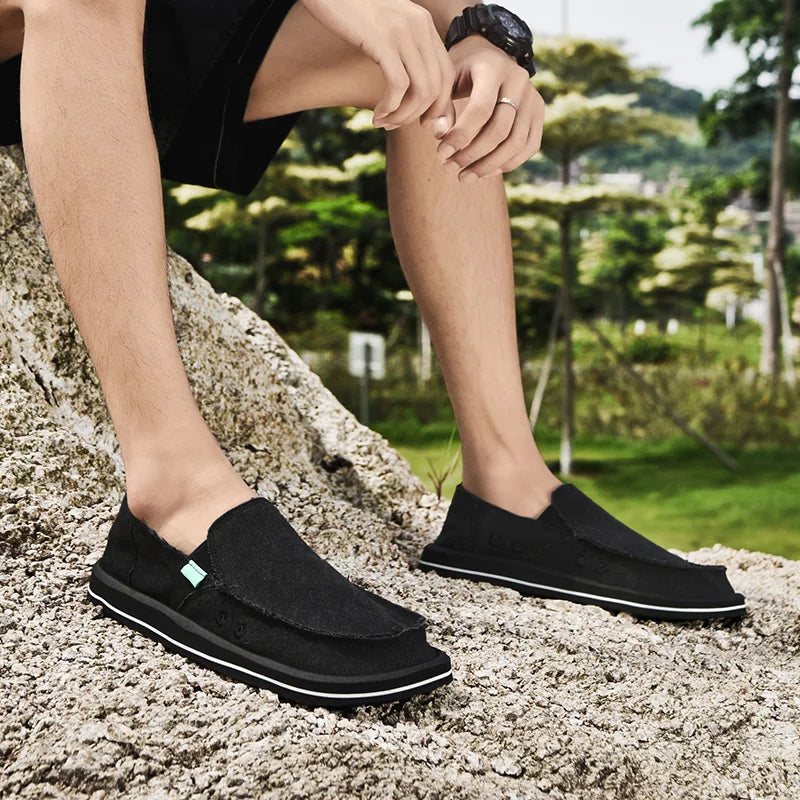 Men's black slip-on shoes, comfortable design for casual outings