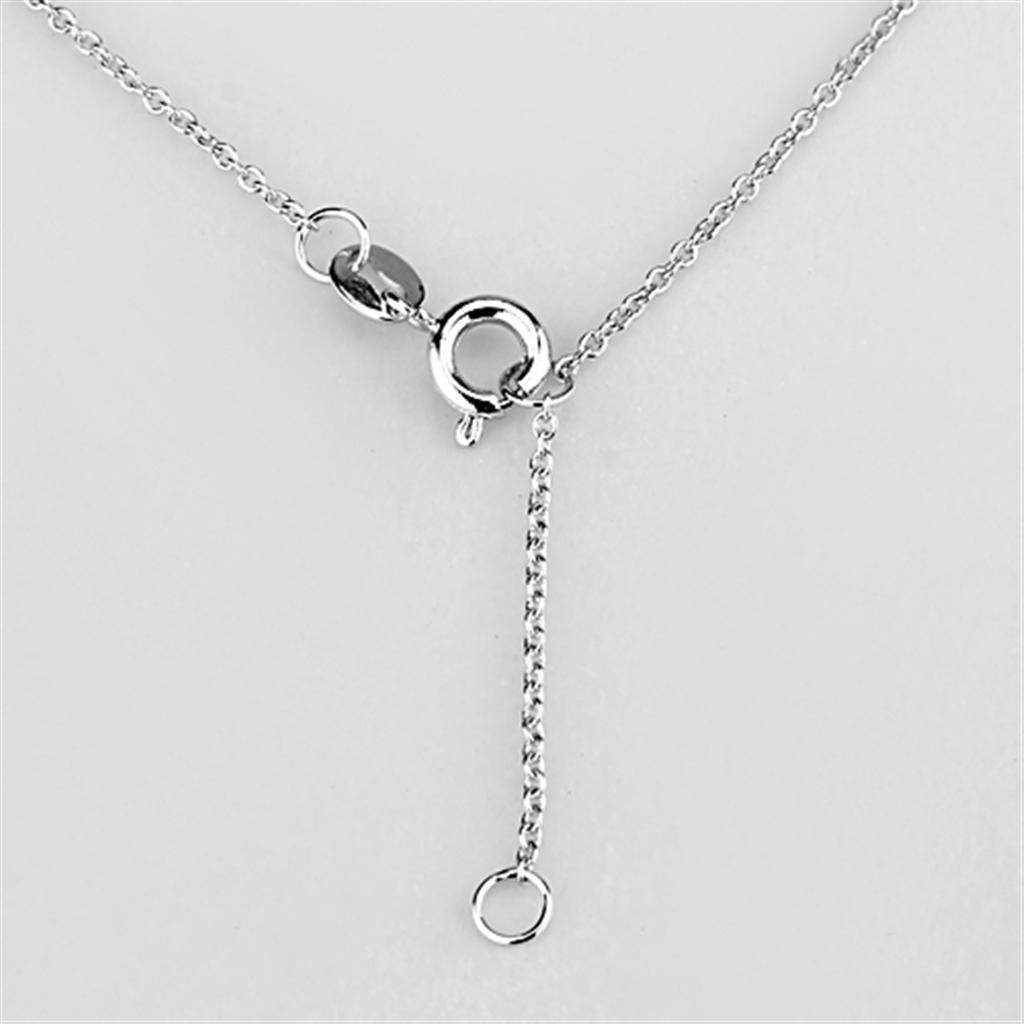 Close-up of a modern rhodium pendant necklace with a delicate chain and adjustable clasp