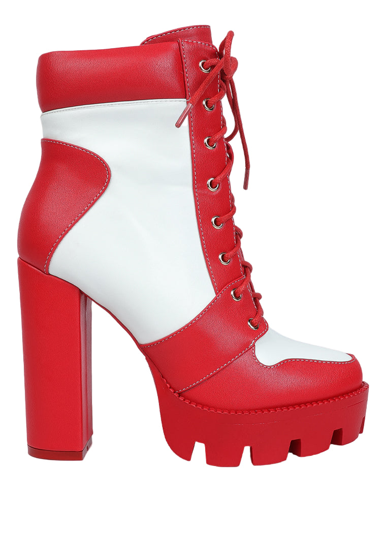 Red and white platform boot with a high block heel on a white background