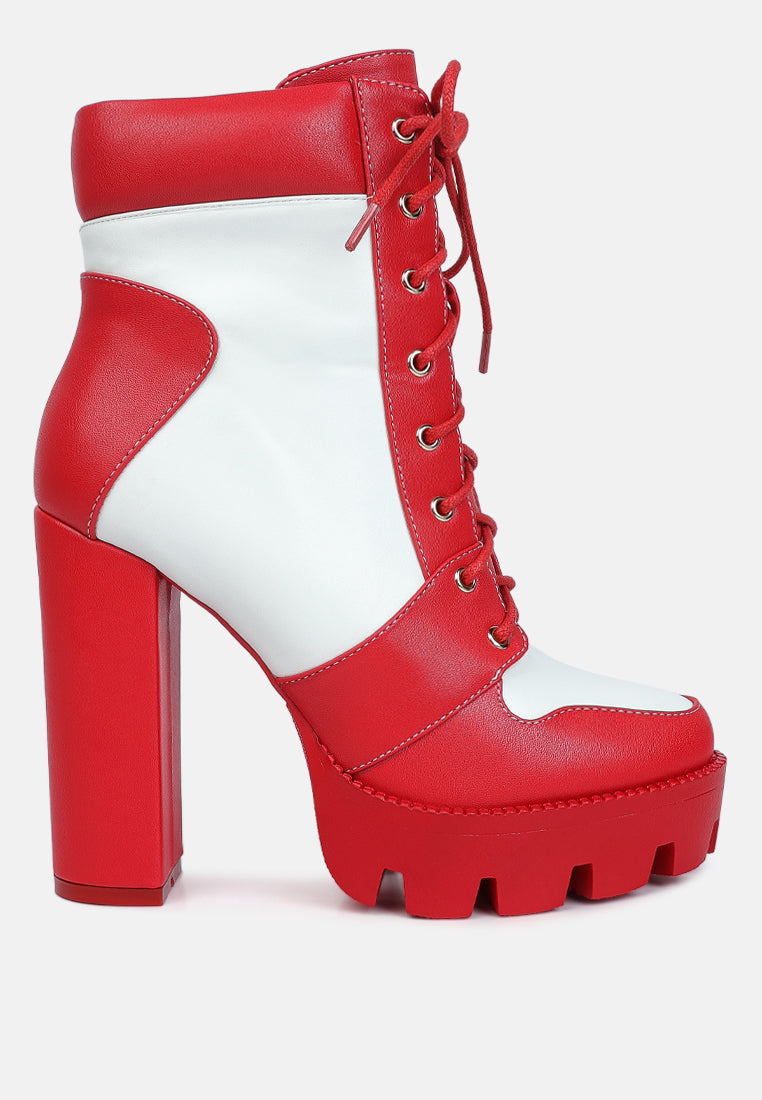Red and white platform boot with a high block heel on a white background